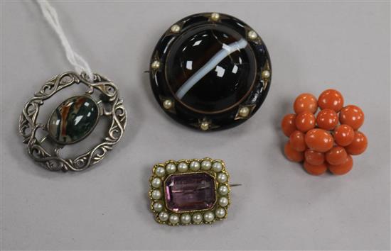 A Victorian yellow metal, enamel, seed pearl and banded agate brooch (af) and three other brooches including coral.